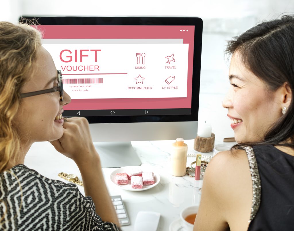 Gift voucher and coupon concept on a desk