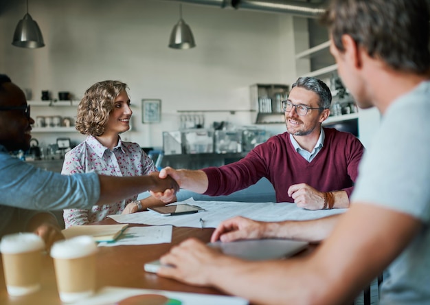 Two small business owners discussing a partnership