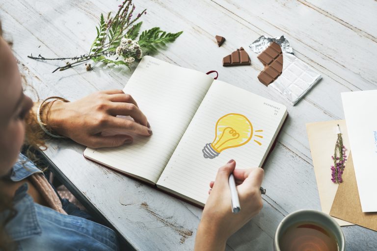 Light bulb sketch on paper representing content ideas