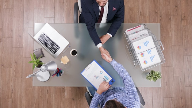 Business people shaking hands after a meeting