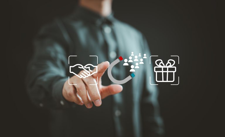 Customer engagement and loyalty concept with people drawn toward a handshake