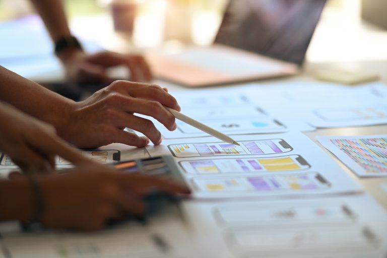 Creative team planning website wireframes and project structure
