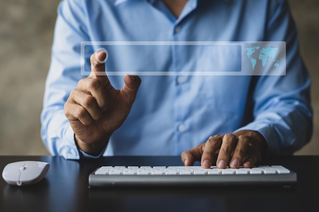 Hand typing a search query on a computer keyboard