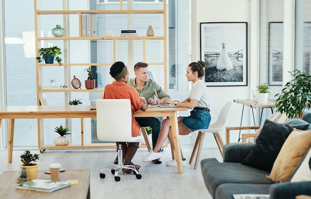 Business owner meeting with a web designer to discuss a website project