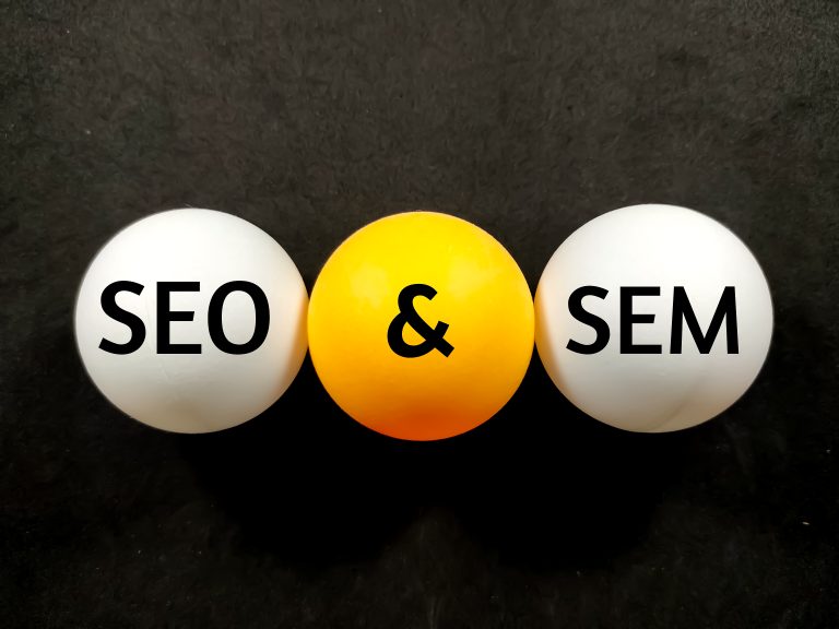 SEO and SEM words representing organic and paid search marketing