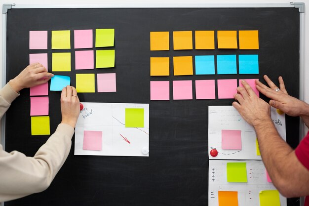 Team planning a project with sticky notes