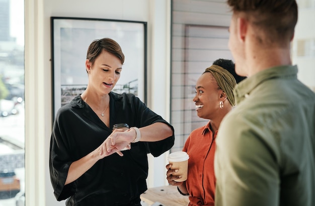 Business people planning around a schedule and client deadline