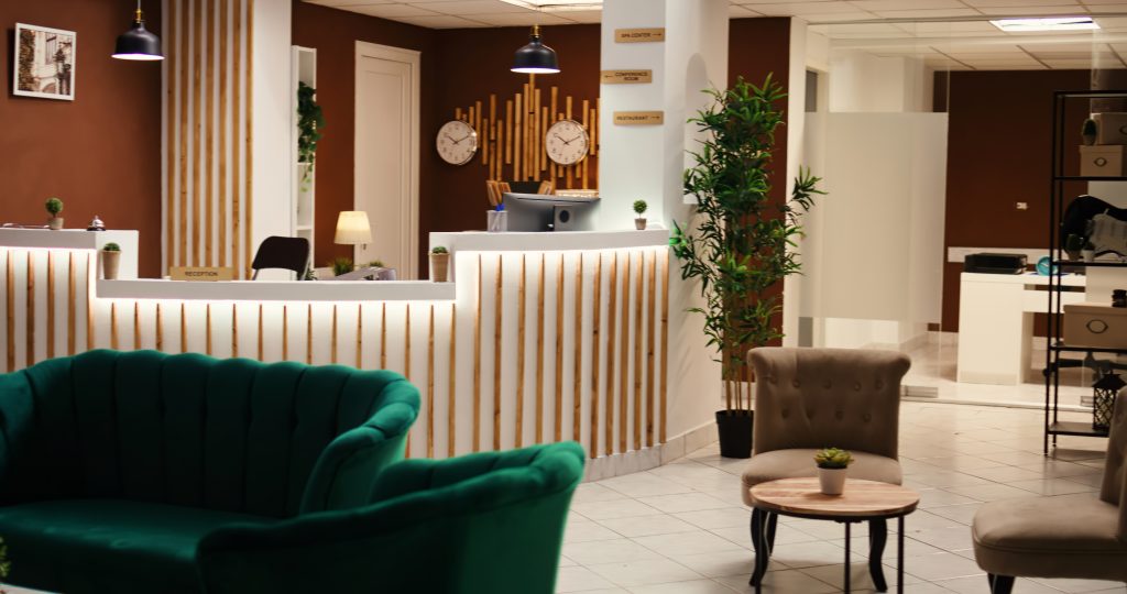 Hotel lobby with reception desk and seating area