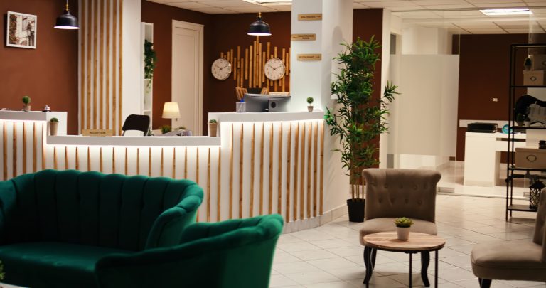 Hotel lobby with reception desk and seating area