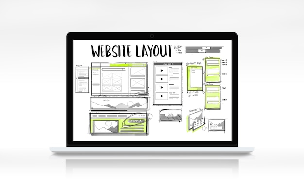 Website layout sketch on a desk