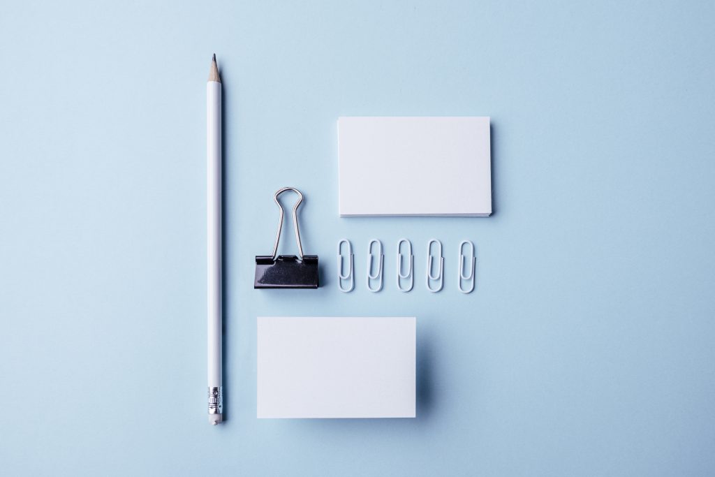White stationery and business cards on a desk