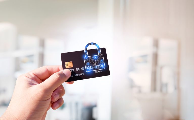 Credit card protected by a padlock representing ecommerce payment security