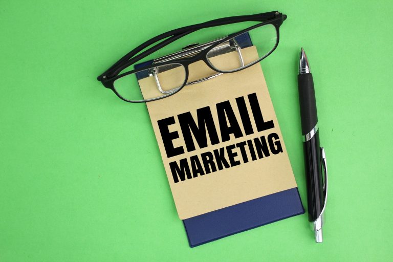 Notebook with email marketing written on it