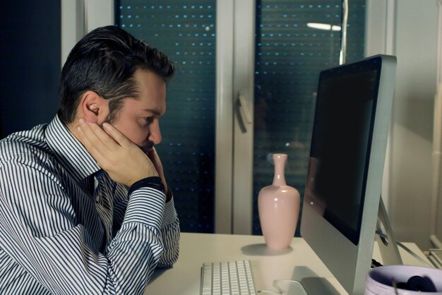 Business owner considering cyber security tasks