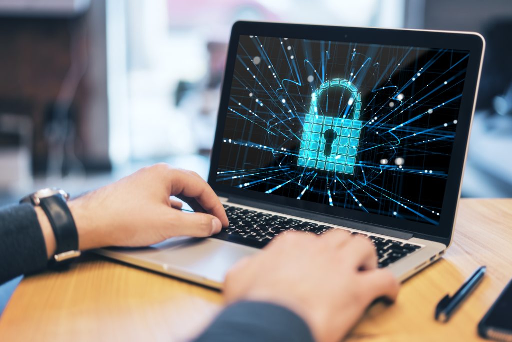 Laptop with a digital padlock symbol representing WordPress website security